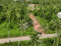 Urgent sale! Vacant land 1 rai 1 ngan 57.3 sq. wah (2,229.2 sq. meters) in a prime location near Wat Pradu, behind HomePro, close to Surat Thani Hospital and CentralSurat Thani. 18-meter frontage.