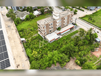 URGENT SALE - L-shaped commercial land behind HomePro, near Central and Lotus Suratthani. Area 1 rai 8.4 sq. wah, frontage 16 m.