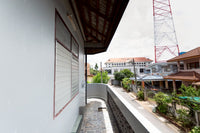 [Reserved] 3-story dormitory, 8 bedrooms, 4 bathrooms, 21.9 sq. wah. Located 200 meters from the back gate of the provincial school. Good location, great value for 3.X million baht. Surat Thani.