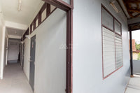 [Reserved] 3-story dormitory, 8 bedrooms, 4 bathrooms, 21.9 sq. wah. Located 200 meters from the back gate of the provincial school. Good location, great value for 3.X million baht. Surat Thani.