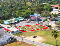 Land for sale, divided into plots, 69 sq. wah, 15-meter frontage, located at Thamuang T-junction, Khanom, Nakhon Si Thammarat.