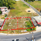 Land for sale, divided into plots, 69 sq. wah, 15-meter frontage, located at Thamuang T-junction, Khanom, Nakhon Si Thammarat.
