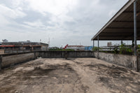 [For Sale] Land with 3.5-story building + rooftop, 32.7 sq. wah, 2 units, at the entrance of Soi Karunrat 15. Downtown location, can be renovated into a hostel.* Surat Thani, 3 beds, 3 baths.