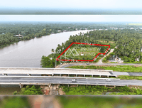 Urgent sale: Vacant land in Surat Thani, next to the Tapi River, near Ford Showroom, Bangkok Hospital, and Central Department Store. Size 6 rai 46 square wah.