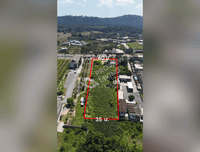 Urgent sale: Vacant land on the main road in Surat Thani, near Mega Home, Bang Yai Intersection. 5 rai 1 ngan 81.1 sq. wah, 60 meters wide.