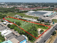 Urgent sale: Vacant land on the main road in Surat Thani, near Mega Home, Bang Yai Intersection. 5 rai 1 ngan 81.1 sq. wah, 60 meters wide.
