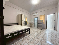 For urgent sale: Dormitory in Suratthani, Special Soi, Prince of Songkla University. Fully rented all year. Size 21.9 sq. wah, 7 bedrooms with en-suite bathrooms in every room. There is a hall on the ground floor for opening a shop. 8 bathrooms.