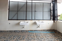 [Reserved] 3-story dormitory, 8 bedrooms, 4 bathrooms, 21.9 sq. wah. Located 200 meters from the back gate of the provincial school. Good location, great value for 3.X million baht. Surat Thani.