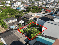 Land for sale, subdivided plots, 53 sq. wah / 2 plots, in the heart of Surat Thani market, 24-meter frontage, near Thaksin Hospital. Price 2.3 million baht.