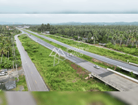 Urgent sale: Vacant land in Surat Thani, next to the Tapi River, near Ford Showroom, Bangkok Hospital, and Central Department Store. Size 6 rai 46 square wah.