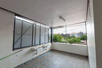 [Reserved] 3-story dormitory, 8 bedrooms, 4 bathrooms, 21.9 sq. wah. Located 200 meters from the back gate of the provincial school. Good location, great value for 3.X million baht. Surat Thani.