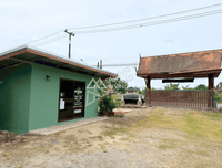 URGENT SALE: Two-story detached house in Surat Thani, with land size of 153.9 square wah. Roadside frontage. 2.3 km from Phunphin Railway Station. 2 bedrooms, 2 bathrooms.