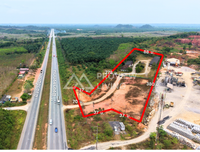 Land for sale on Asia Road, Saweat, Tha Chang, Surat Thani, 19 rai, with office and warehouse, price 4X.XX million.