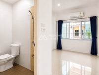 Urgent sale: Two-story detached house, Siraphat Private Thung Gong. 3 bedrooms, 2 bathrooms. Near Bangkok Hospital, Central Plaza, and Surat Thani Hospital.