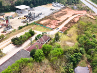 Land for sale on Asia Road, Saweat, Tha Chang, Surat Thani, 19 rai, with office and warehouse, price 4X.XX million.