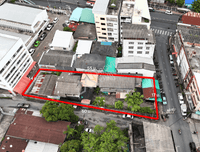 Urgent sale! Land with existing structures, 230 sq.w. in the heart of Surat Thani, behind the post office, near Surat Thani Girls' School. Corner plot with access from two roads (Premchit Pracha Road and Wat Thammabucha Road).