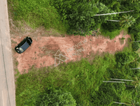 Urgent sale! Vacant land 1 rai 1 ngan 57.3 sq. wah (2,229.2 sq. meters) in a prime location near Wat Pradu, behind HomePro, close to Surat Thani Hospital and CentralSurat Thani. 18-meter frontage.