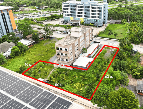 URGENT SALE - L-shaped commercial land behind HomePro, near Central and Lotus Suratthani. Area 1 rai 8.4 sq. wah, frontage 16 m.