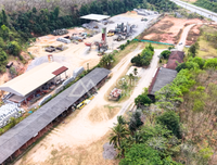 Land for sale on Asia Road, Saweat, Tha Chang, Surat Thani, 19 rai, with office and warehouse, price 4X.XX million.