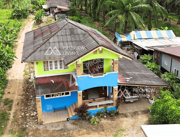 URGENT SALE: Two-story detached house in Surat Thani, with land size of 153.9 square wah. Roadside frontage. 2.3 km from Phunphin Railway Station. 2 bedrooms, 2 bathrooms.