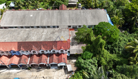 Urgent Sale: Corner House in Surat Thani, large plot, good location – Saowaluck 1 Village Soi 19, 2-story house, 8.5 meters wide, 90.5 sq. wah. Price only 2.XX million. 2 beds, 2 baths.