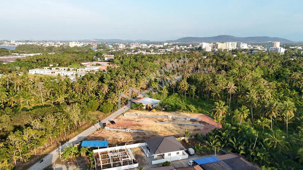 Urgent sale: Vacant land, filled, 1 rai 2 ngan plus. Located in Bang Chum Tho, near Tsubame Sushi and Central Surat Thani.