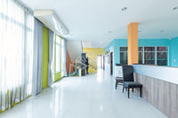 Urgent sale: Corner commercial building, 2 units, 5 bedrooms, 4 bathrooms, 3 kitchens, built-in + fully furnished. Prime location in Sri Kasem, heart of Surat Thani.