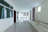 Urgent sale: Corner commercial building, 2 units, 5 bedrooms, 4 bathrooms, 3 kitchens, built-in + fully furnished. Prime location in Sri Kasem, heart of Surat Thani.