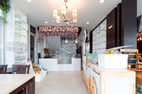Urgent sale: Corner commercial building, 2 units, 5 bedrooms, 4 bathrooms, 3 kitchens, built-in + fully furnished. Prime location in Sri Kasem, heart of Surat Thani.