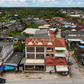 Urgent sale: 2 commercial buildings in Surat Thani, 63.4 sq. wah, opposite Wat Tha Rai School, near Tha Thong Market.