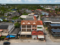 Urgent sale: 2 commercial buildings in Surat Thani, 63.4 sq. wah, opposite Wat Tha Rai School, near Tha Thong Market.