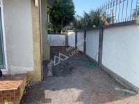 Urgent sale: Two-story detached house, Siraphat Private Thung Gong. 3 bedrooms, 2 bathrooms. Near Bangkok Hospital, Central Plaza, and Surat Thani Hospital.